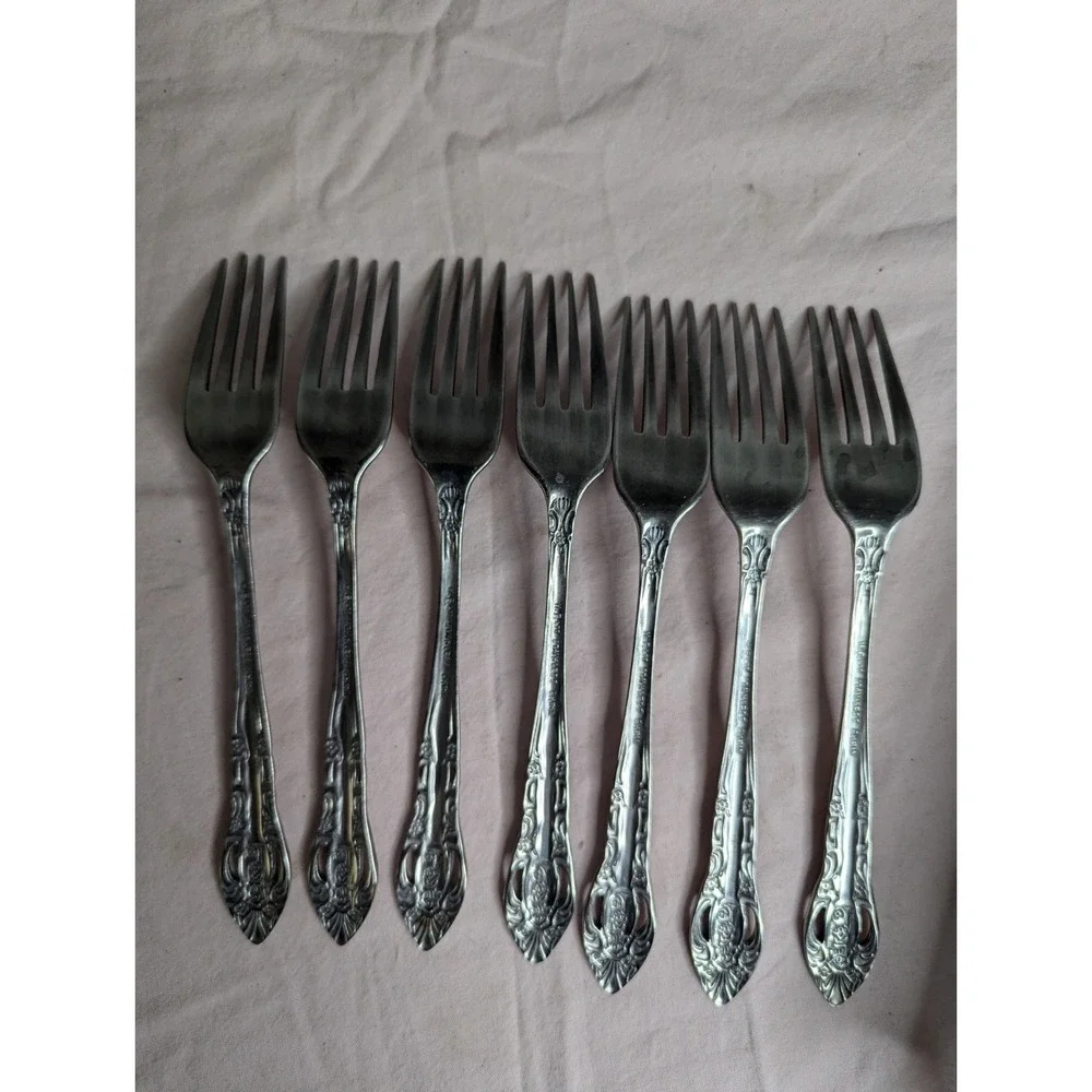 7 lot H.F. LTD Stainless stamped flower pattern 7
